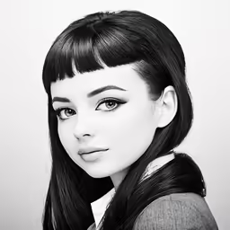 a black and white portrait of a girl with long dark hair