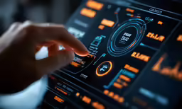 a person holding something over an electronic device