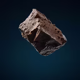 a piece of chocolate cake that is falling down