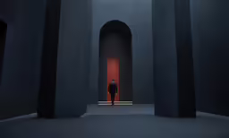 a man stands in the middle of a dark room
