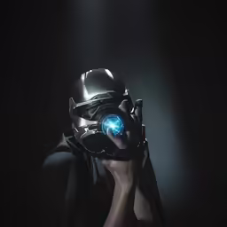 a female with her hand on a camera holding a helmet