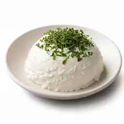 a small white plate with a small cooked dish on it