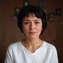this is an image of a woman with short hair