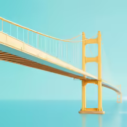 a bridge over a body of water under a blue sky