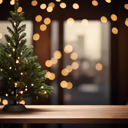 a small christmas tree is sitting on a table