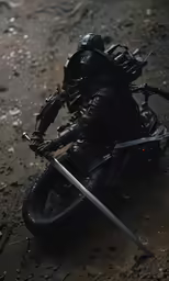 a photo of a motorcycle on the ground and its wheels leaning back