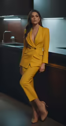 the woman poses in an yellow suit