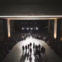 a group of people are standing in a circle