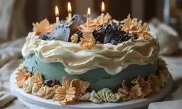 a cake with many candles that are lit in the night