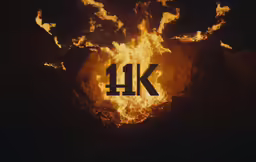 the burning wood is covered in the letters k and w