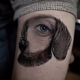 a guy with some art on his thigh