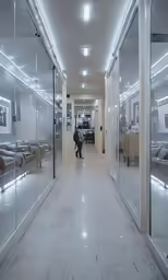 the long hallway leading to the living room is clean