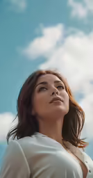 a woman with a nice breast looks upward