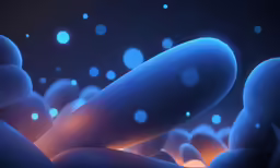 many blue spheres are on a black background