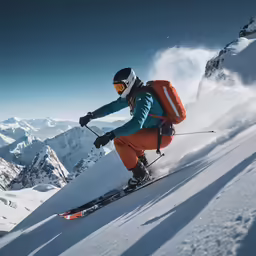 a skier going down a hill on top of a mountain