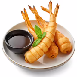 several large french fries with dipping sauce on a plate