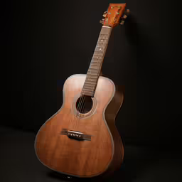 a wooden guitar sits against a dark background