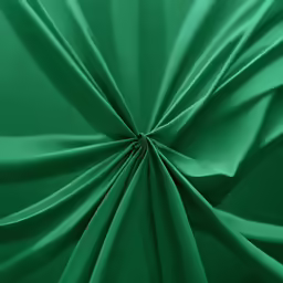 a green cloth with ridges and a circular center piece