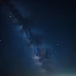 stars are shining above a field and the sky