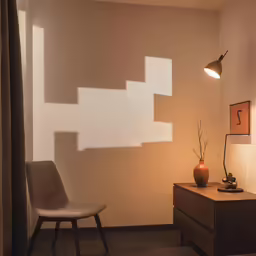 a room with light and shadows on the walls
