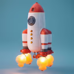 a toy white and red rocket ship next to small yellow balls