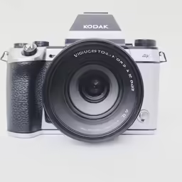 the camera is sitting next to the lens