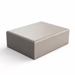 a concrete box sitting on top of a table