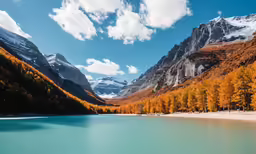 the mountains surrounding this lake appear to be filled with snow