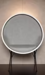 a white and black chair with gray seat and back cushion