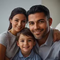 a couple and child in a photo with their parents