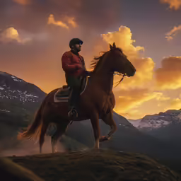 man in uniform on horseback, overlooking mountains and cloudy sky