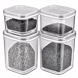 three clear storage containers with black beads