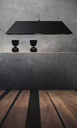 a pair of candle holders sitting next to each other
