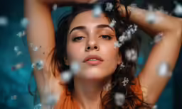 a woman that has her hands on her head