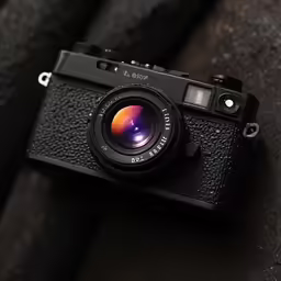 an old style camera is shown with its lens
