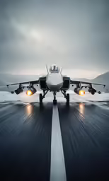 an airplane on the runway with lights on
