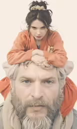 a woman riding the head of an elderly man