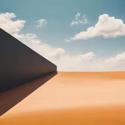 a very pretty view of some big shapes in the sand