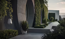 a line of modern looking plants outside of a building