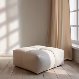 a living room with a large window and a floor lamp