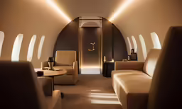 a very long airplane with a fancy interior