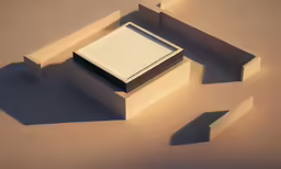 a white box is sitting in the middle of some sand