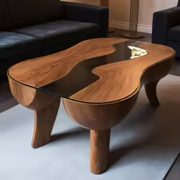 a table with wooden frame and glass top in a living room