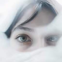 closeup image of woman with blue eyes