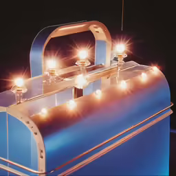 several bright bulbs are illuminated in a blue lit suitcase