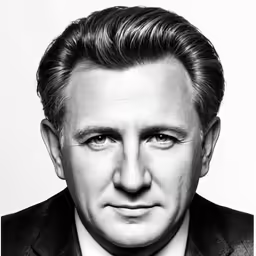 black and white photograph of man with a suit and tie