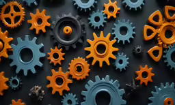 assorted colorful gears against a black backdrop