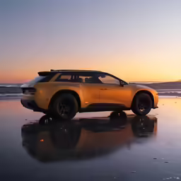 a yellow sports utility vehicle is sitting on the beach