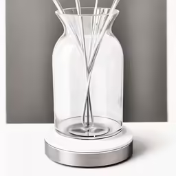 an image of a vase with a spoon
