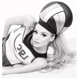 a woman with a basketball hat lying on a bed